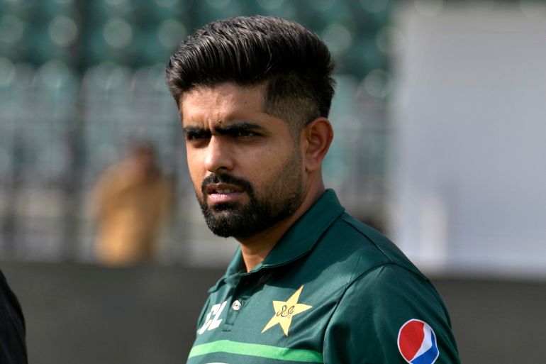 Pakistan's skipper Babar Azam walking at a one-day international cricket matches series, in Rawalpindi, Pakistan.