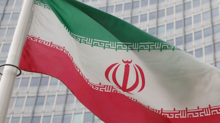 The Iranian flag flutters outside the International Atomic Energy Agency (IAEA) headquarters in Vienna, Austria on March 6, 2023.