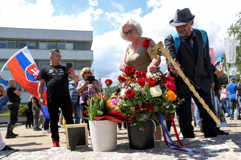 Supporters bring flowers and gifts as they gather near the FD Roosevelt University Hospital, where Slovak Prime Minister Robert Fico was hospitalised following an assassination attempt, in Banska Bystrica, Slovakia