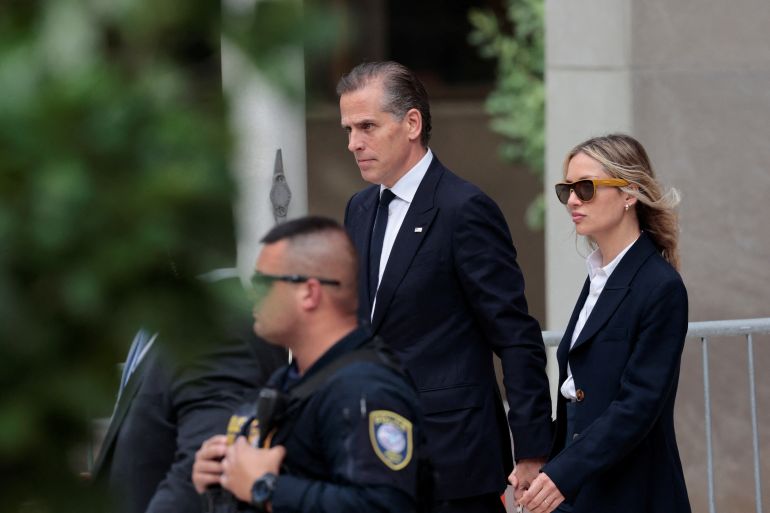 Hunter Biden, son of US President Joe Biden, and his wife Melissa Cohen Biden, leave the federal court during his trial on criminal gun charges in Wilmington