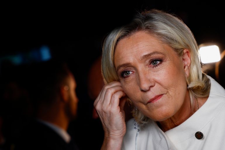 French far-right leader Marine Le Pen gets ready before an interview with journalists [File: Sarah Meyssonnier/Reuters]