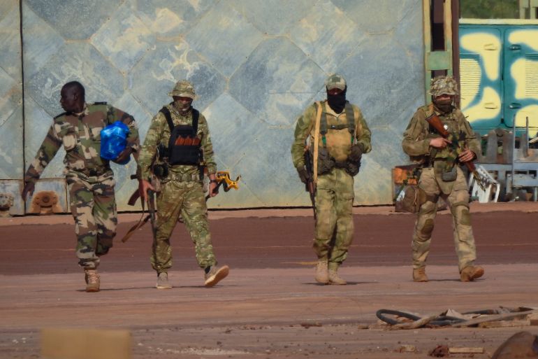 An undated photograph provided by the French military shows three Russian mercenaries in northern Mali [French Army via AP]