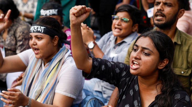 Medics protest the rape and murder of a trainee medic at a government-run hospital in Kolkata