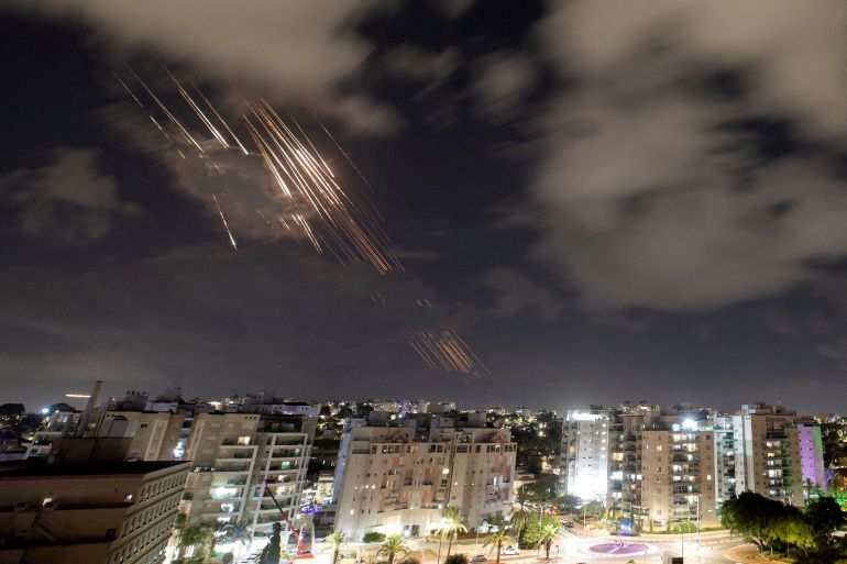 FILE PHOTO: Israel's Iron Dome anti-missile system intercepts rockets after Iran fired a salvo of ballistic missiles, as seen from Ashkelon, Israel, October 1, 2024 REUTERS/Amir Cohen ATTENTION EDITORS: ADDING INFORMATION/File Photo