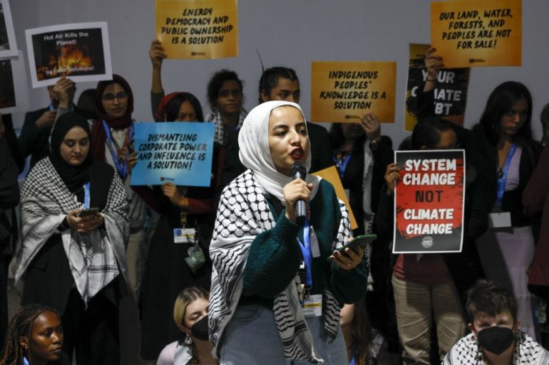Climate activists stage a protest during the United Nations Climate Change Conference COP29 in Baku