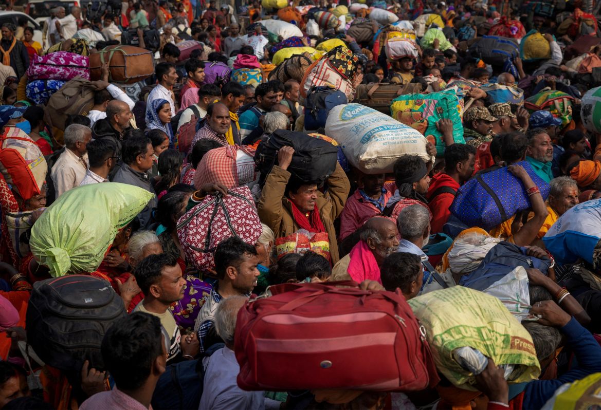 3 Millions of Hindus take 'holy dip' a day after fatal stampede