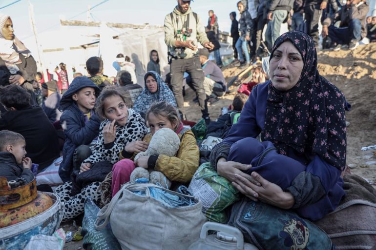 Ansaf Khadra has been waiting at al-Nuwairi Hill with her children, hoping to return to northern Gaza