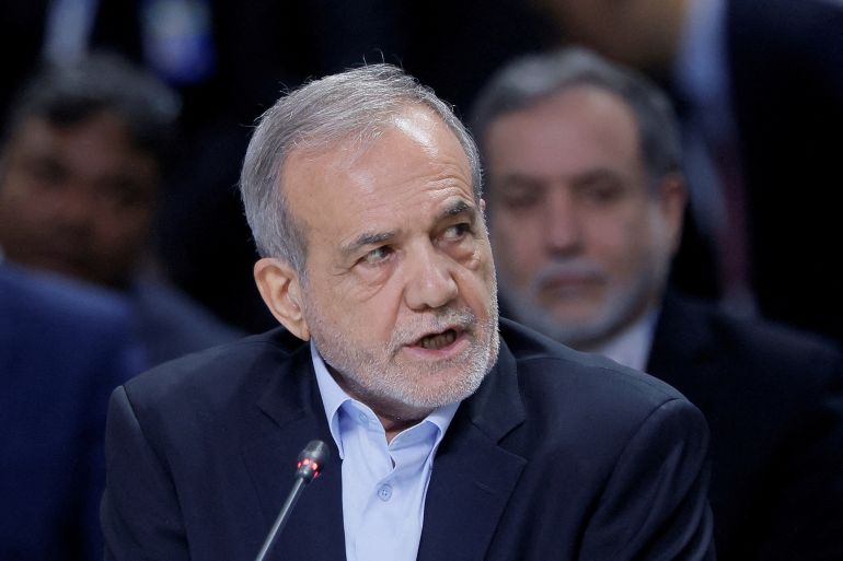 FILE PHOTO: Iranian President Masoud Pezeshkian speaks during a plenary session in the outreach/BRICS Plus format at the BRICS summit in Kazan, Russia October 24, 2024. REUTERS/Maxim Shemetov/Pool/File Photo