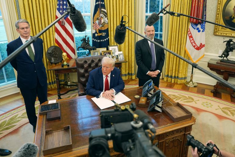 US President Donald Trump speaks as he prepares to sign an executive order in the Oval Office of the White House in Washington, DC on February 3, 2025