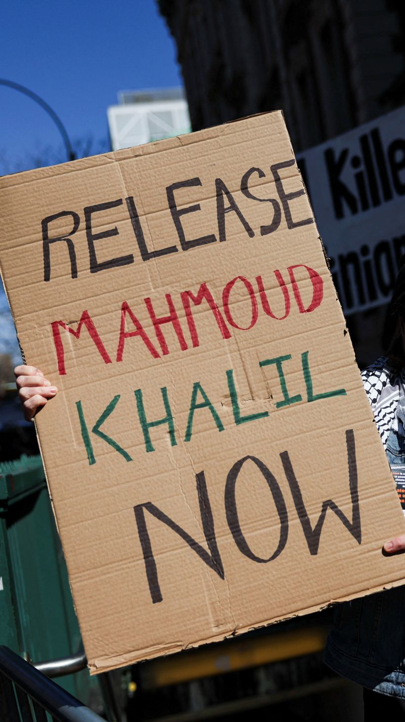 A person holds a sign during a protest following the arrest by US. immigration agents of student protester Mahmoud Khalil at Columbia University