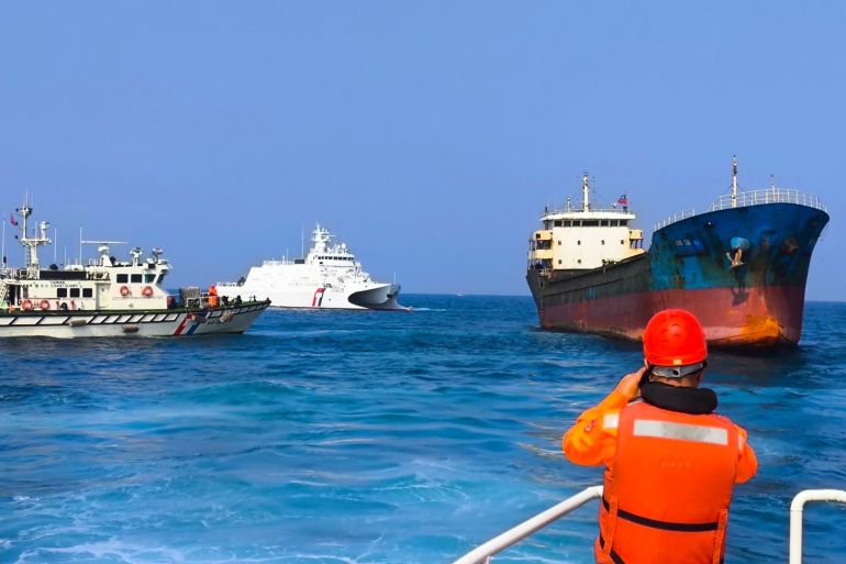 Taiwan's Coast Guard prepares to board the Togo-flagged cargo ship Hong Tai 58.