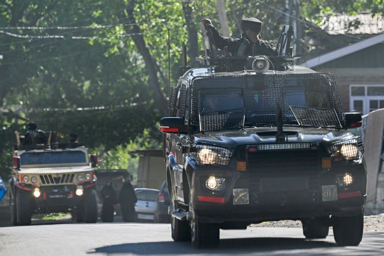 Indian army patrols on way to Hapatnar in Anantnag district south of Kashmir