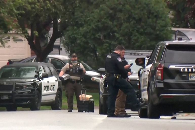 Police stand at a crime scene as they searched for a suspect posing as a police officer who shot two Democratic state lawmakers and their spouses in their homes, in the Minneapolis suburb of Champlin, Minnesota, U.S. June 14, 2025 in a still image from video. ABC Affiliate KTSP via REUTERS. NO RESALES. NO ARCHIVES THIS IMAGE HAS BEEN SUPPLIED BY A THIRD PARTY