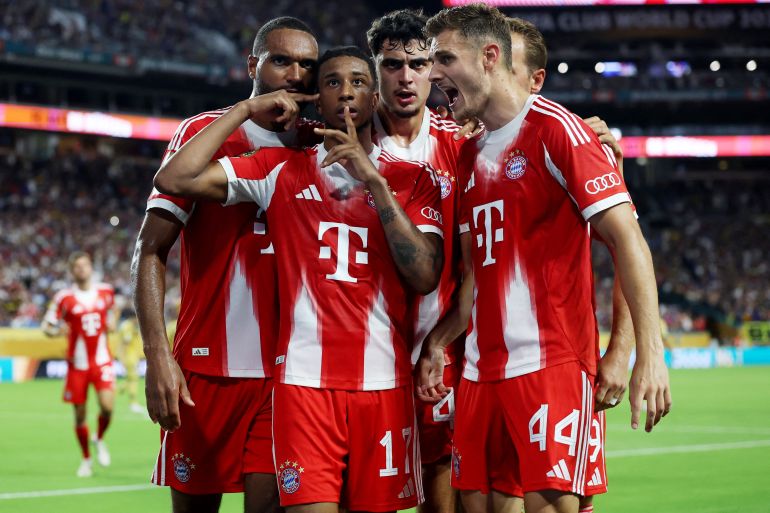 Bayern Munich's Michael Olise celebrates scoring their second goal with teammates
