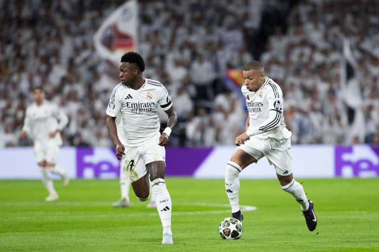 Real Madrid’s star forward duo of Vinicius Jr, left, and Kylian Mbappe play their first FIFA Club World Cup group match against Saudi Pro League side Al Hilal on June 18 at the Hard Rock Stadium in Miami, Florida