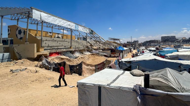 A lone grandstand remains partially intact in an otherwise completely destroyed Khan Younis football stadium. The venue, once a popular cultural and social hub of the Khan Younis sports community, has now become a shelter for thousands of internally displaced Gazans