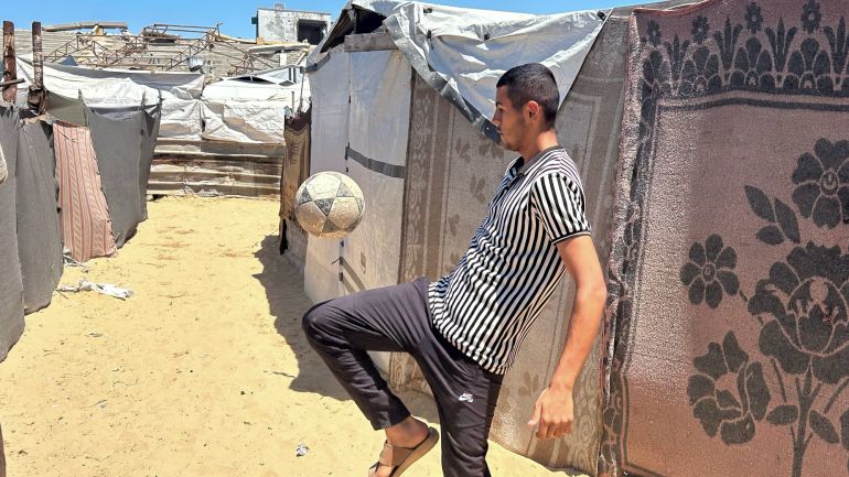 Yousef Abu Shawarib, who has lived as a refugee at Khan Younis football stadium since May 2024, hopes to survive the war and once again play football on these grounds