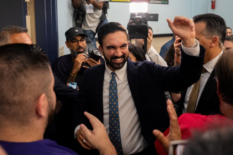 New York City mayoral candidate Zohran Mamdani waves to supporters at an event on July 2