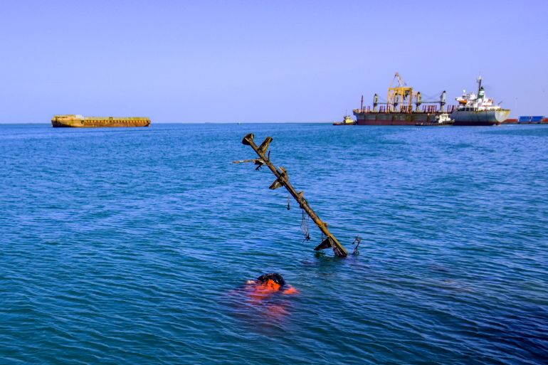 A sunken vessel is pictured at a site hit by Israeli forces in the Huthi-controlled port of Hodeida on the Red Sea on