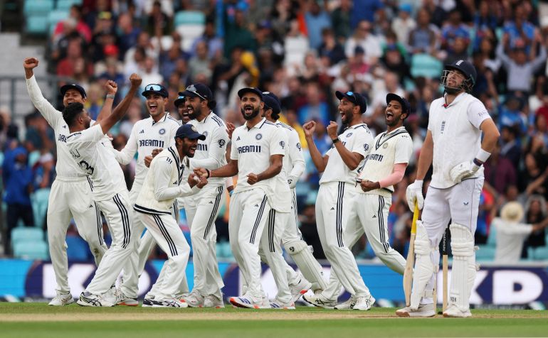 India’s Mohammed Siraj celebrates with teammates after taking the wicket of England’s Jamie Overton during the fifth Test