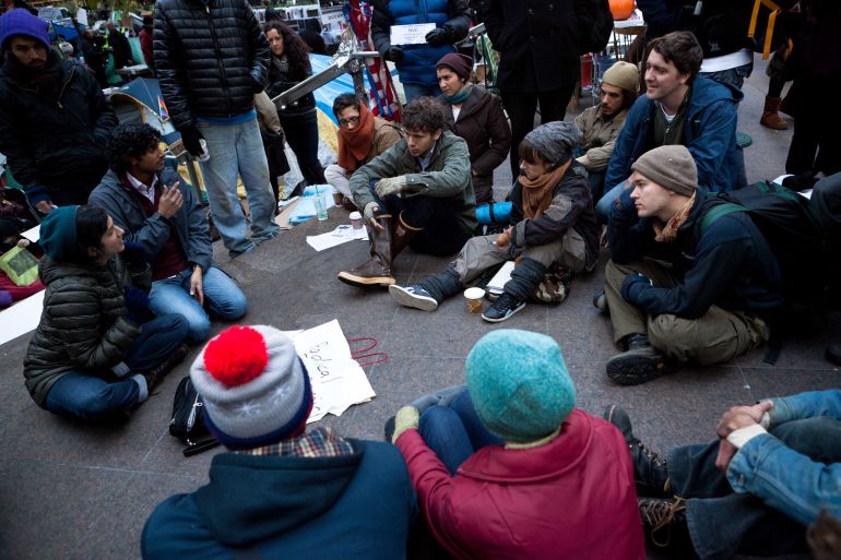 Occupy Wall Street protesters attend a meeting in Zuccotti Park in November 2011