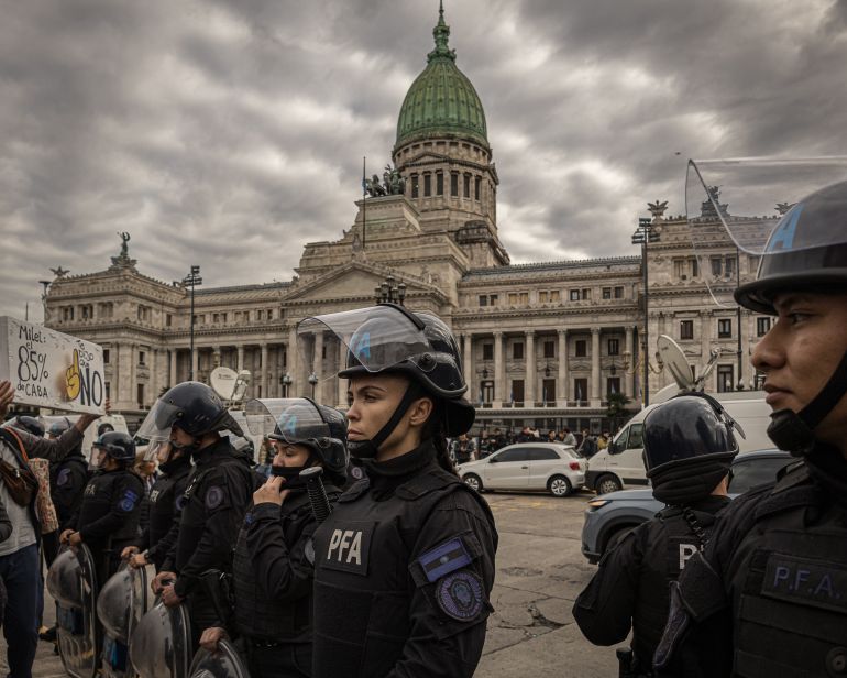 Security forces form a line near Argentina's Congress building on July 16