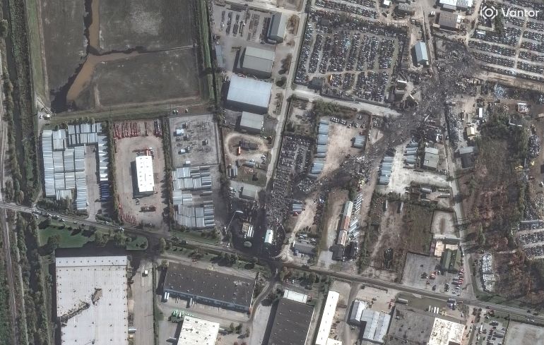 A satellite image shows the crash site of a UPS cargo plane at Muhammad Ali International Airport
