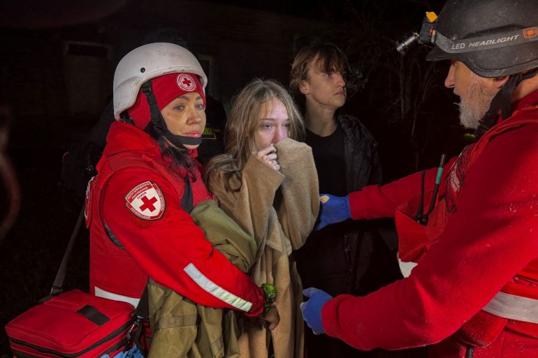 A girl reacts after her mother was killed during a Russia drone attack.