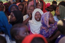 Displaced women and children at a camp where they sought refuge.