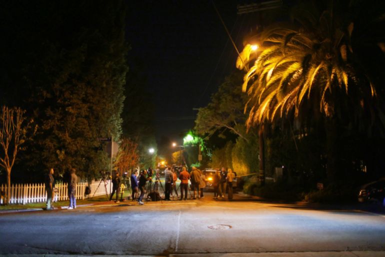 Media people gather near Rob Reiner’s residence, December 14, 2025, in the Brentwood section of Los Angeles, US