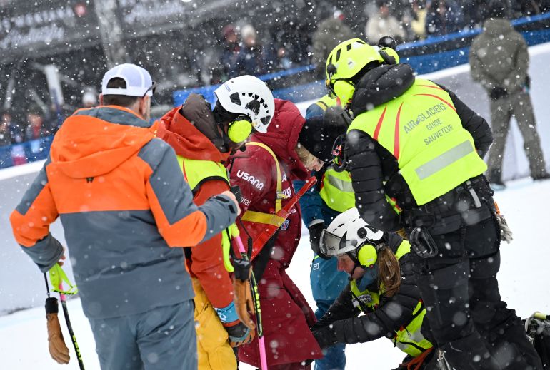 Vonn is helped by emergency services before being airlifted to hospital