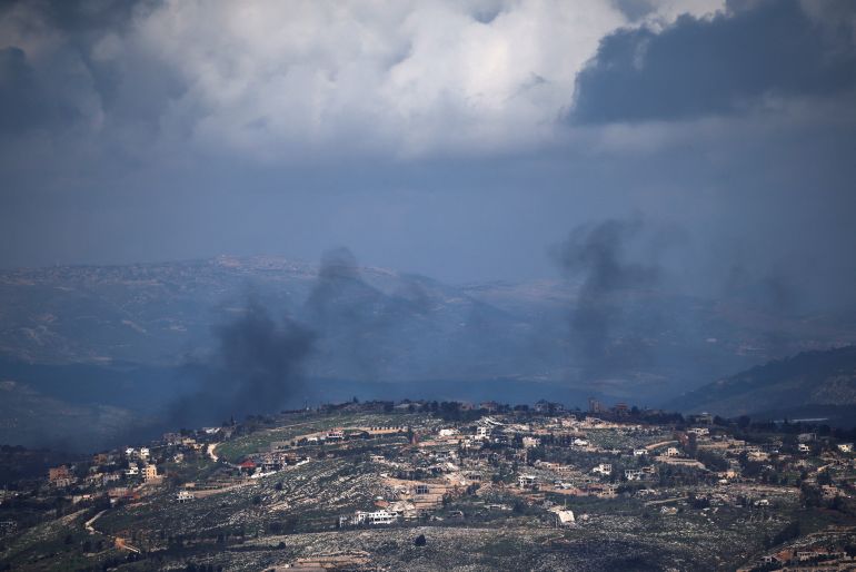 Smoke rises from a village in Lebanon following an Israeli attack, amid escalation between Hezbollah and Israel and amid the US-Israeli conflict with Iran, as seen from northern Israel