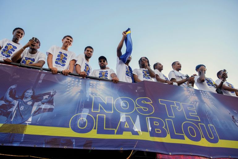 Curaçao players take part in a parade celebrating their qualification for the 2026 FIFA World Cup, in Willemstad, Curacao, Wednesday, Nov. 19, 2025. (AP Photo/Endrymar Martis)