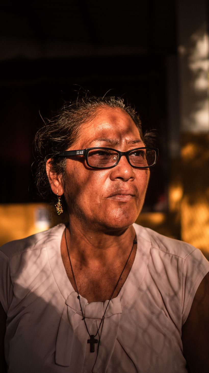 Sara de Perez, 54, one of the mothers of those imprisoned under the state of emergency, pictured in the courtyard of El Rosario’s church, El Salvador [Euan Wallace/ Al Jazeera]
