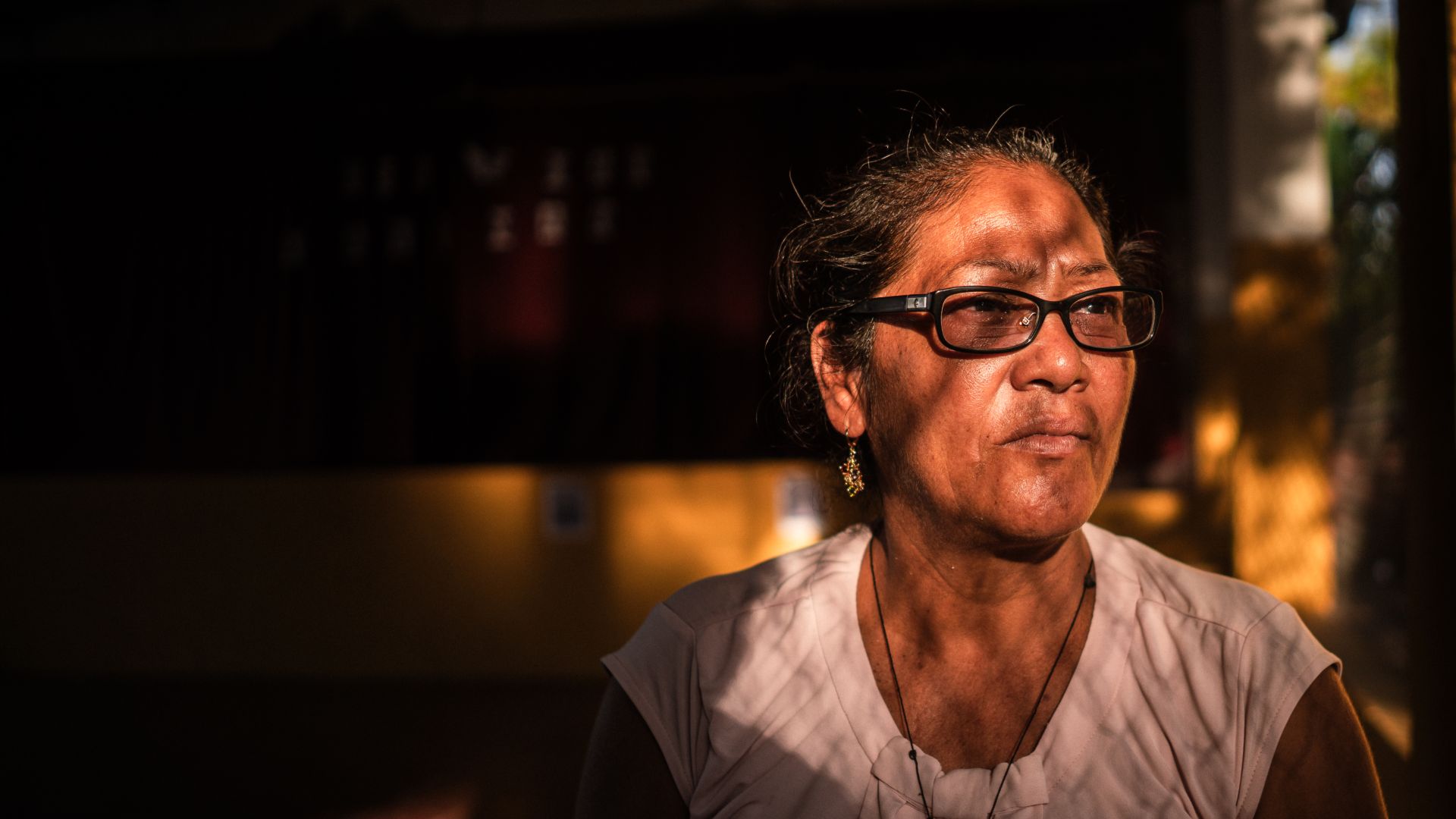 Sara de Perez, 54, one of the mothers of those imprisoned under the state of emergency, pictured in the courtyard of El Rosario’s church, El Salvador [Euan Wallace/ Al Jazeera]