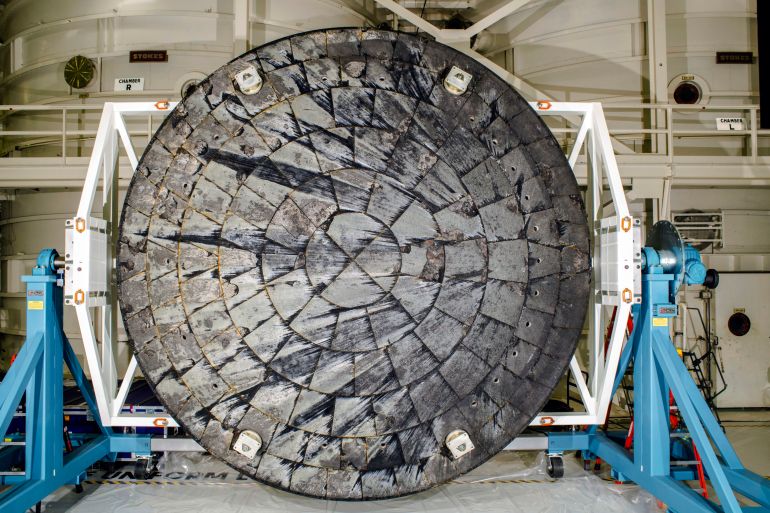An image provided by NASA shows the Orion spacecraft heat shield following the Artemis I test flight after it was removed from the crew module at the Kennedy Space Center in Cape Canaveral