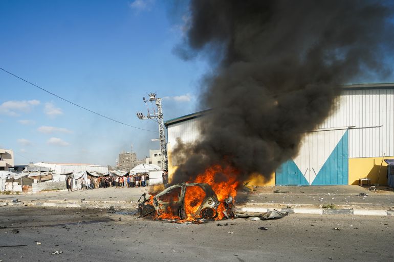 GAZA CITY, GAZA, PALESTINE - JUNE 26: A view of a burned-out vehicle on Salah al-Din Street in central Gaza, Palestine following an Israeli strike on June 26, 2026. Three Palestinians were killed after Israeli forces targeted a civilian vehicle in an attack described as a violation of the ceasefire. The vehicle caught fire as a result of the strike, while medical, civil defense and firefighting teams were dispatched to the area. ( Adam Bilal - Anadolu Agency )