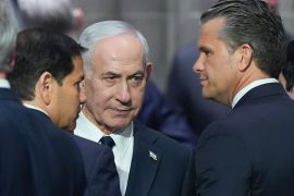 Israeli Prime Minister Benjamin Netanyahu, center, speaks to Secretary of Defense Pete Hegseth, right, and Secretary of State Marco Rubio, left, before the funeral of Sen. Lindsey Graham, R-S.C., Tuesday July 28, 2026, at the Washington National Cathedral in Washington. (AP Photo/Jacquelyn Martin)