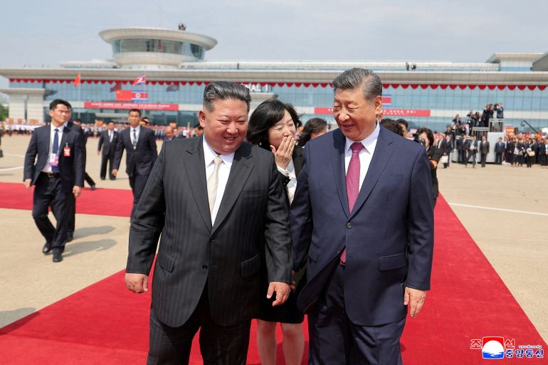 Chinese President Xi Jinping walks with North Korean leader Kim Jong Un as Xi Jinping departs following his state visit to Pyongyang, North Korea, June 9, 2026. KCNA via REUTERS ATTENTION EDITORS - THIS IMAGE WAS PROVIDED BY A THIRD PARTY. REUTERS IS UNABLE TO INDEPENDENTLY VERIFY THIS IMAGE. NO THIRD PARTY SALES. SOUTH KOREA OUT. NO COMMERCIAL OR EDITORIAL SALES IN SOUTH KOREA.