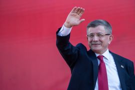 IZMIR, TURKEY - APRIL 30: Former Prime Miniser and Ahmet Davutoglu, and the vice presidential candidate of the Main Opposition alliance, greets to supporters at a rally while campaigning for the presidential election on April 30, 2023 in Izmir, Turkey. CHP leader Kemal Kilicdaroglu is holding campaign rallies across Turkey ahead of the countries May 14, 2023 presidential and parliamentary elections. The Kilicdaroglu-led Nation Alliance is representing six opposition parties in next month's election against President Recep Tayyip Erdogan's 20-year rule. (Photo by Burak Kara/Getty Images)